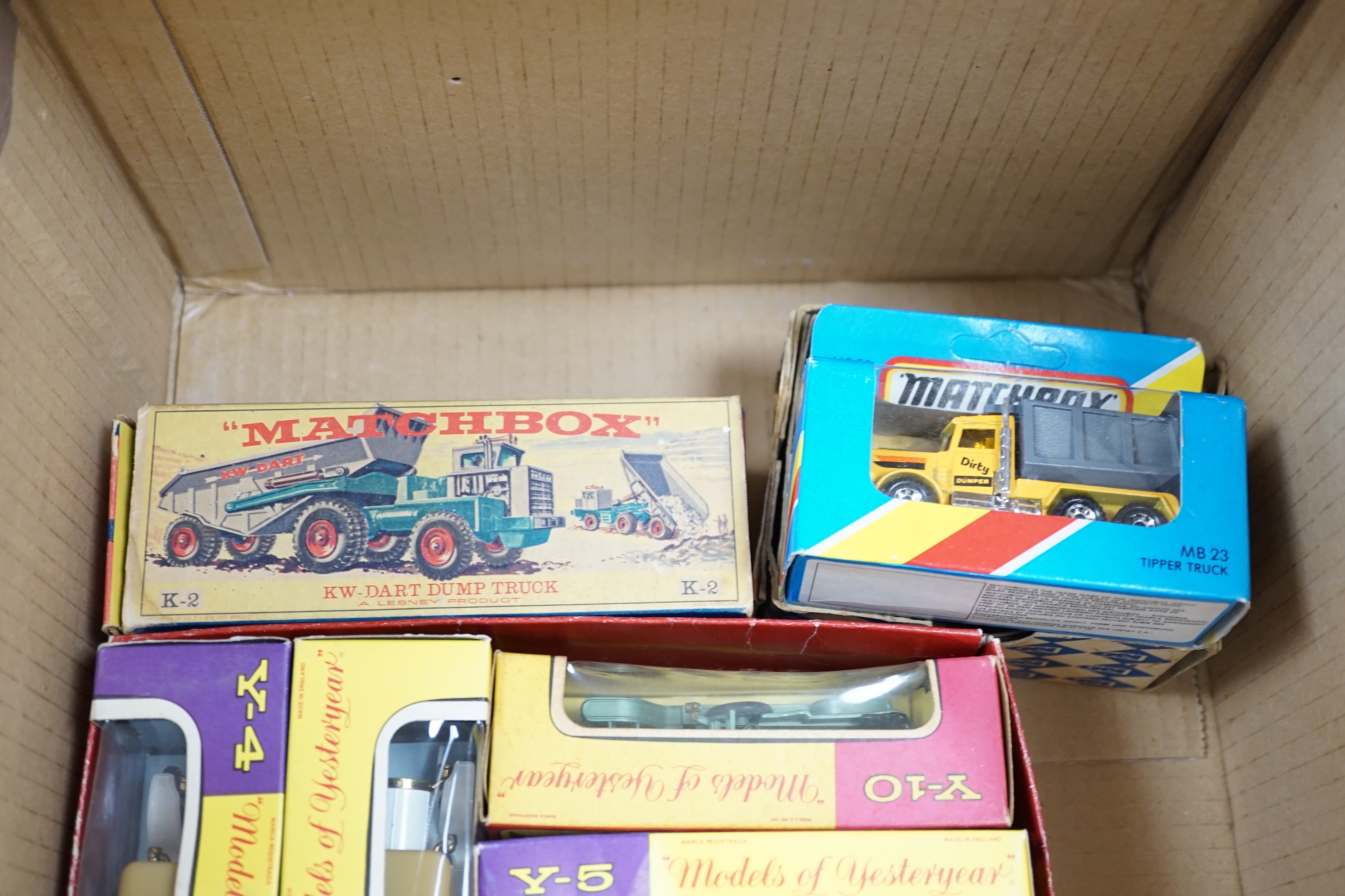 Collection of Tri-ang Minic tinplate vehicles and Matchbox diecast vehicles including ten Tri-ang Minic clockwork vehicles; two Milk Tankers, two Standard Vanguards, a Riley Police Car, a Brewery Tanker, a Minic Transpor